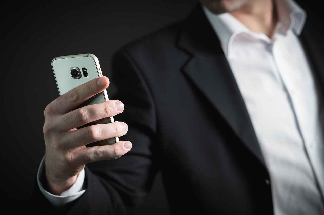 Image - business man smartphone phone