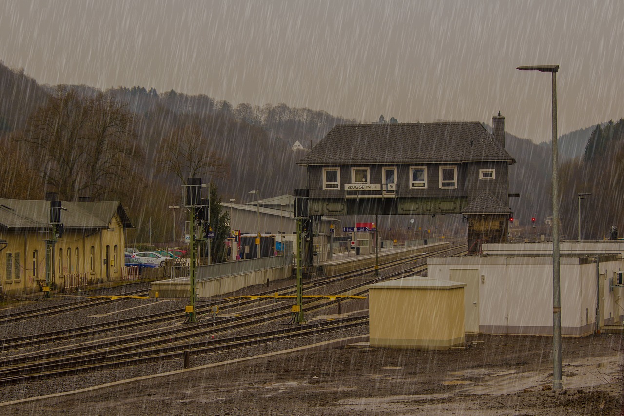 Image - raining railway station train