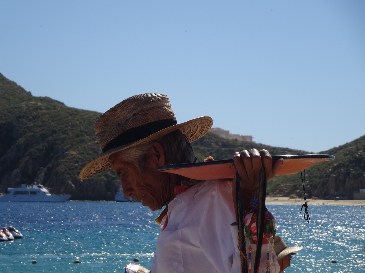 Image - beach seller poverty los cabos