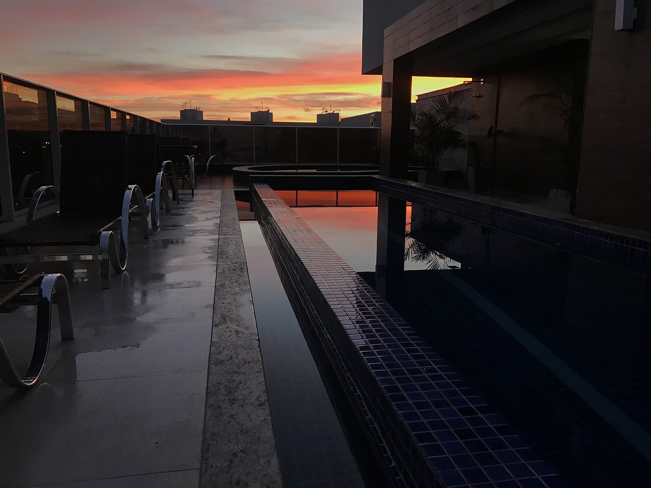 Image - sunrise building pool sky