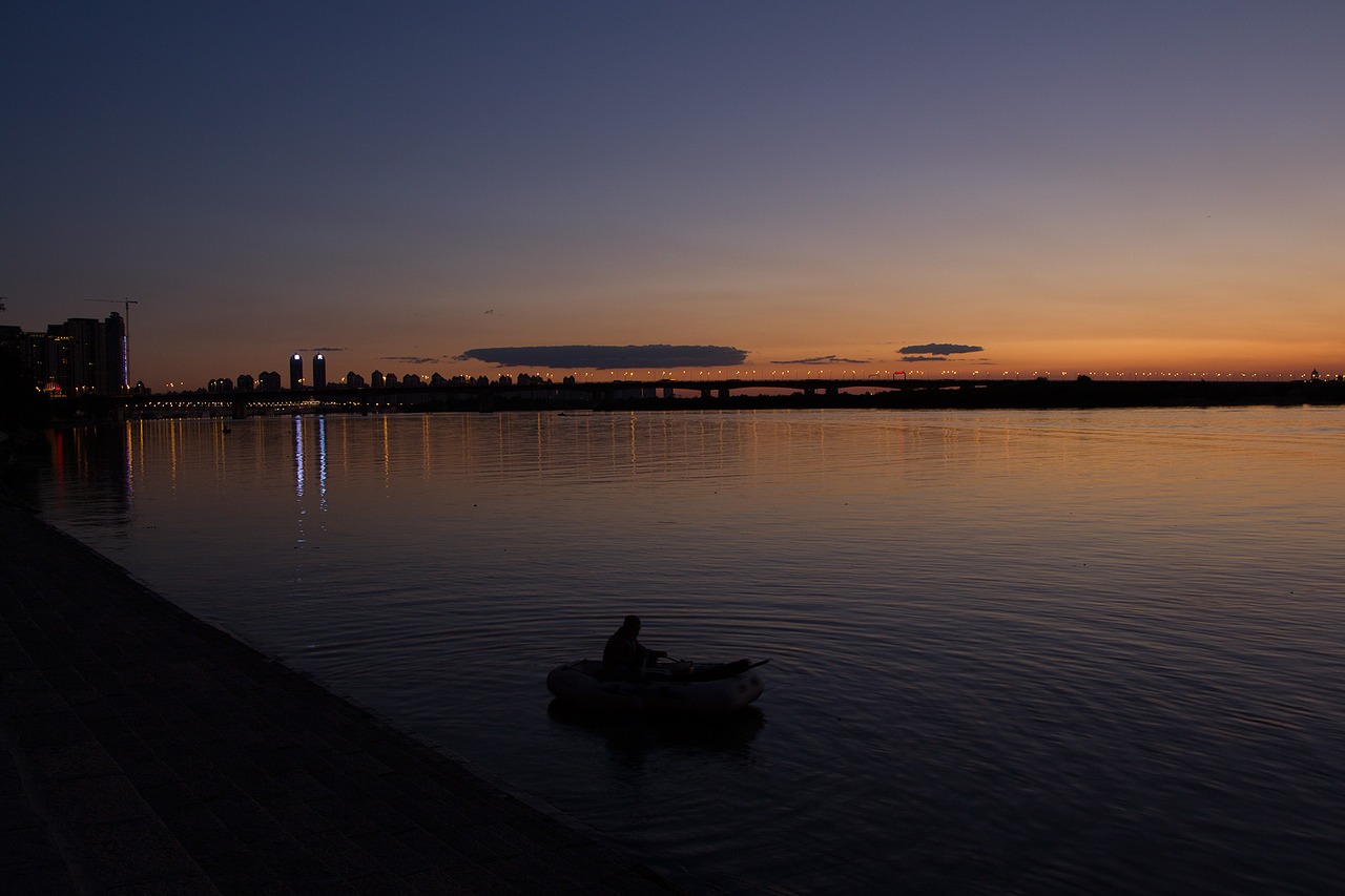 Image - river dinghy afterglow reflection