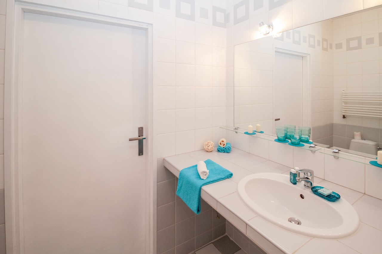 Image - bathroom sink mirror apartment