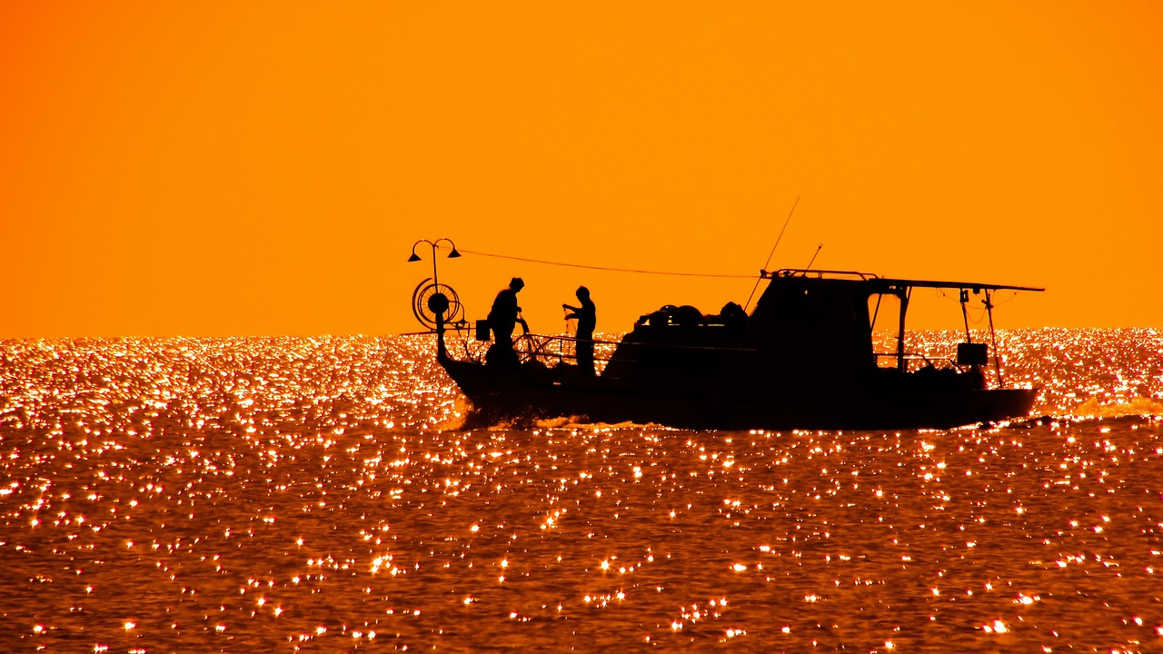 Image - fishing boat afternoon sunset