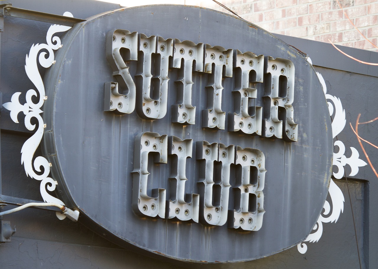 Image - saloon sign sutter club folsom