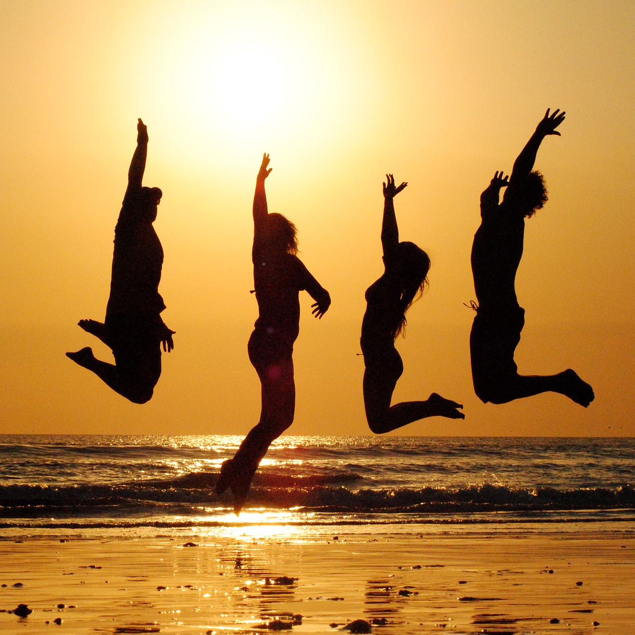 Image - sunset beach group jump people