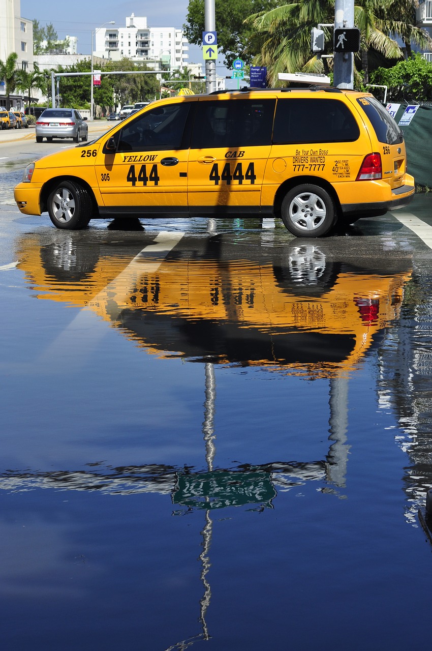 Image - taxi reflection miami street cab