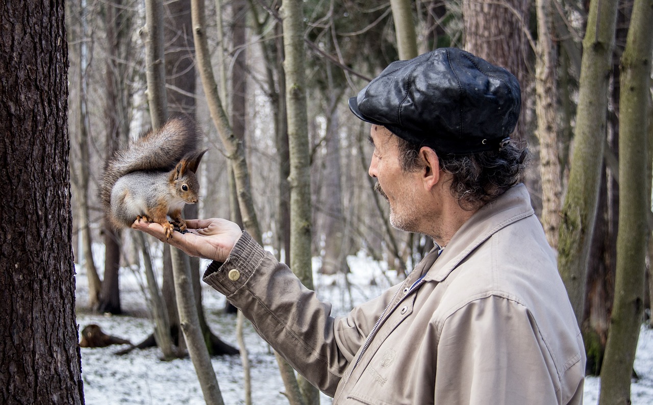 Image - man holding protein belk forest