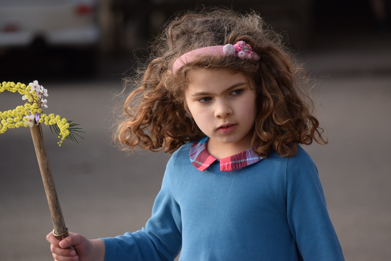 Image - curly girl holding stick portrait