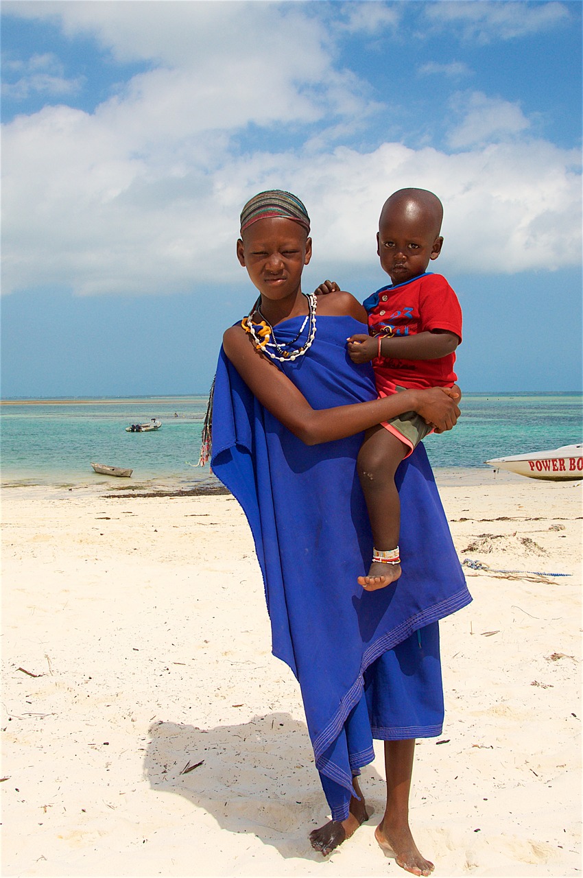 Image - woman with a child beach zanzibar