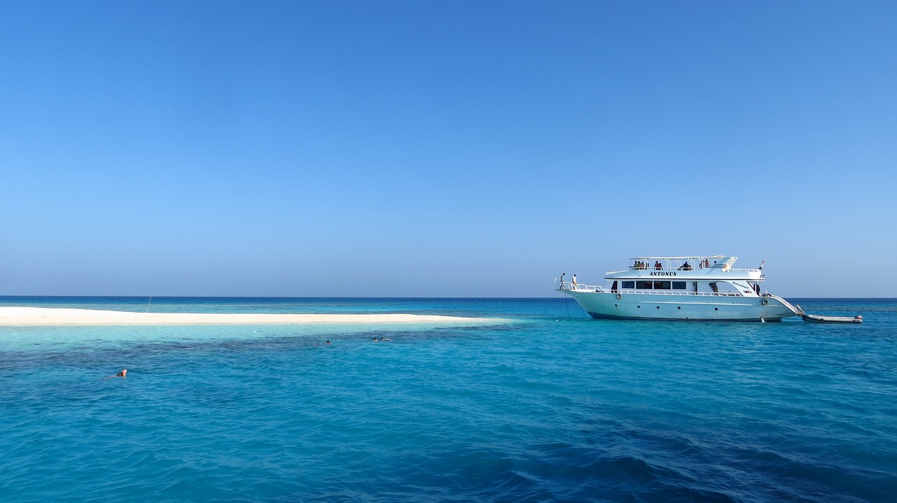 Image - sea beach sandy beach blue boat