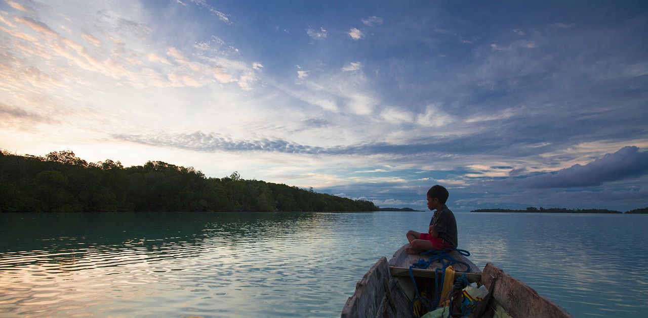 Image - boy boat widi islands twilight