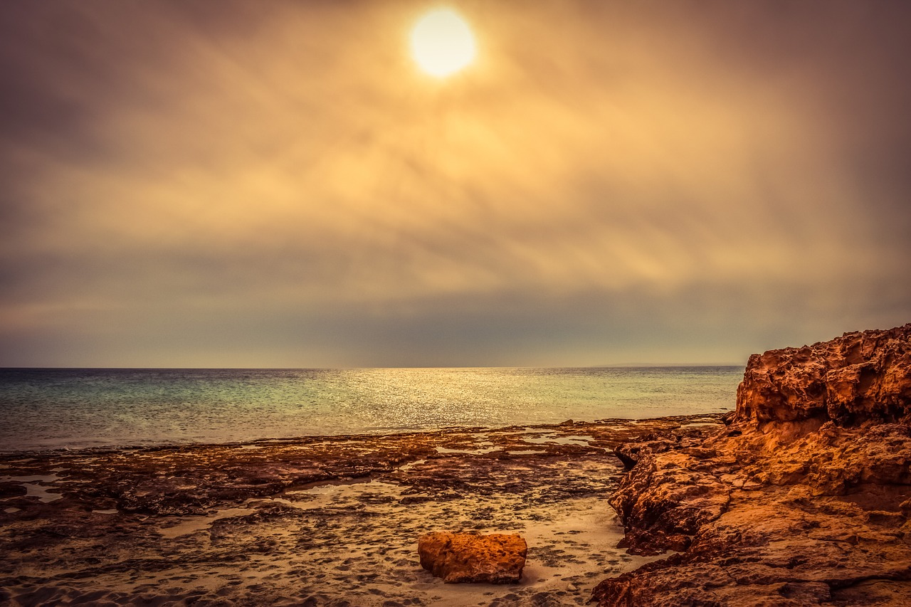 Image - rocky coast beach sea cloudy hazy