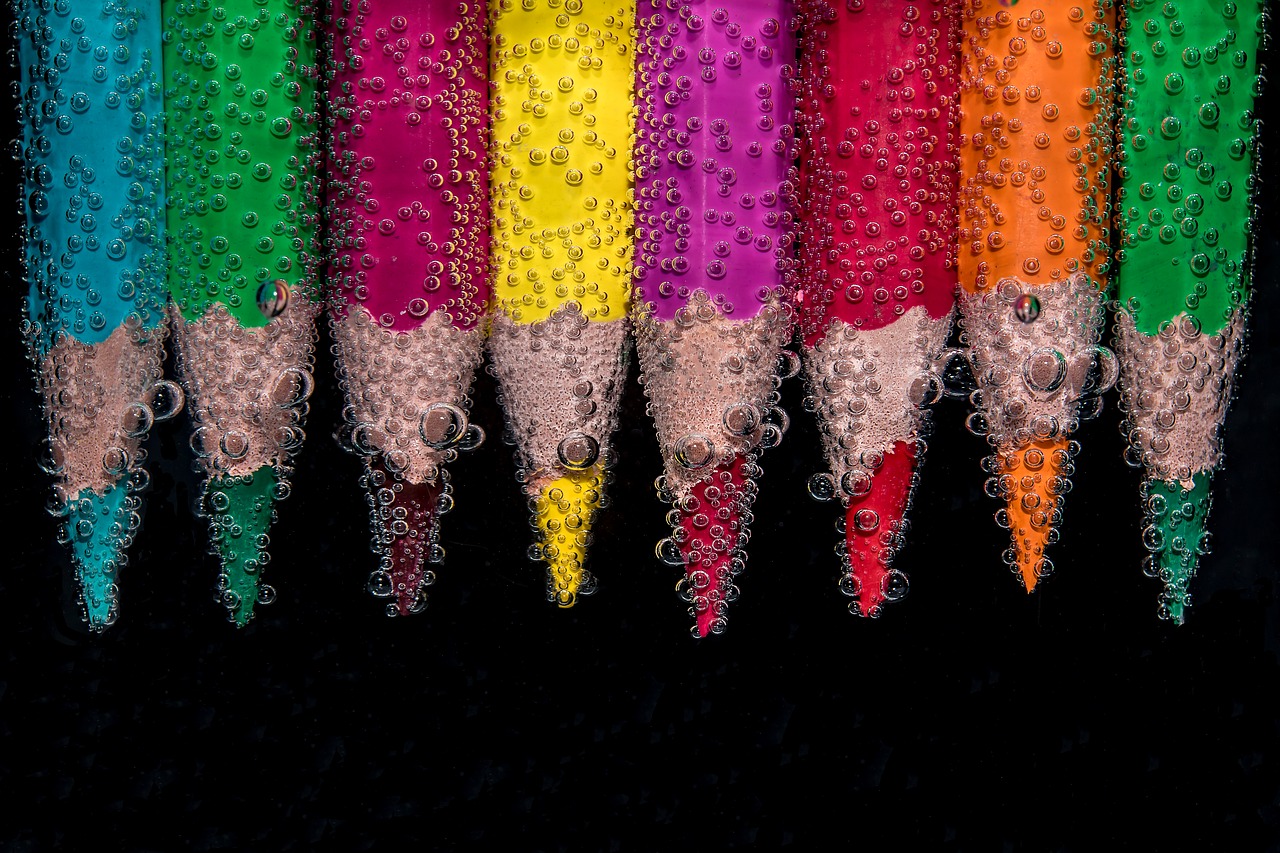 Image - beaded colour pencils in the water