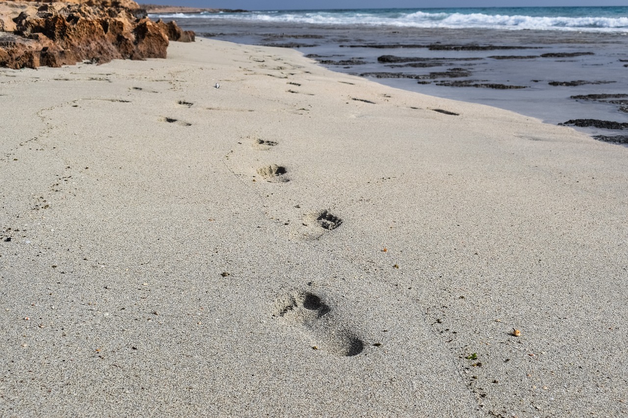 Image - footprints steps sand beach sea