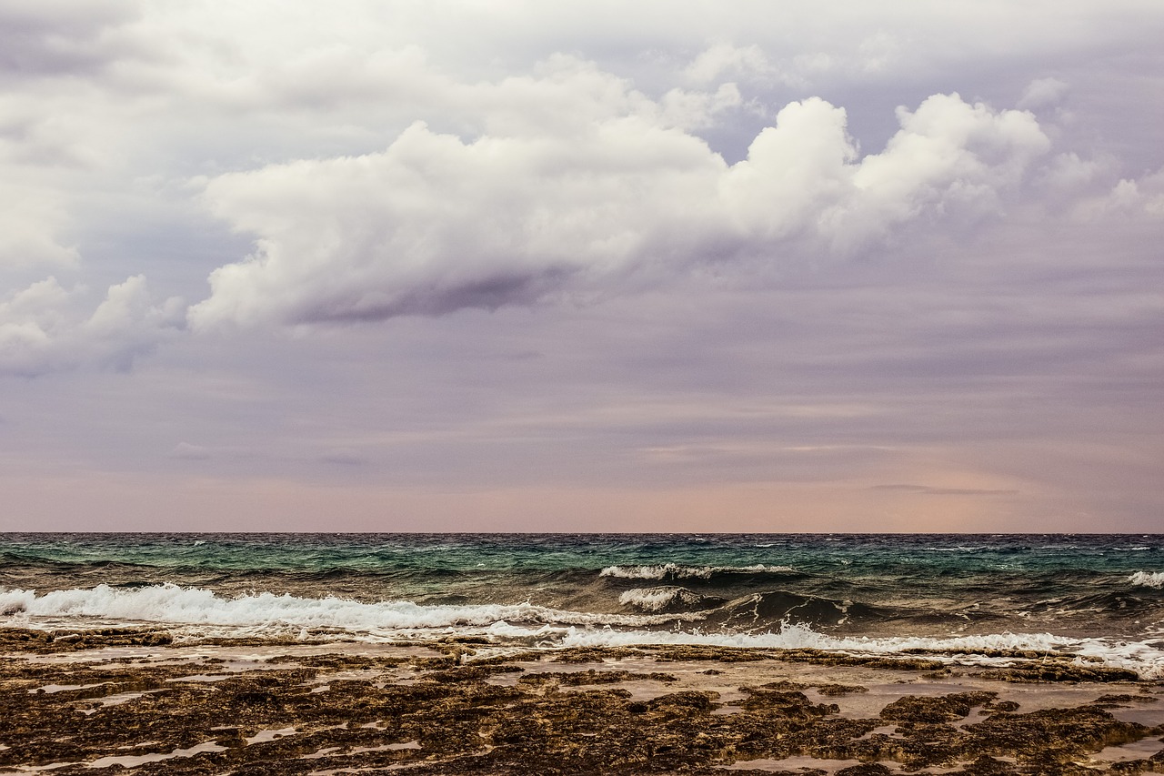 Image - rocky coast sea sky clouds silver