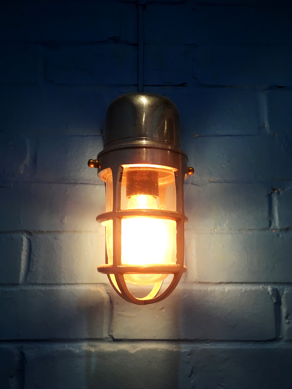 Image - light bulb lamp blue wall brickwork