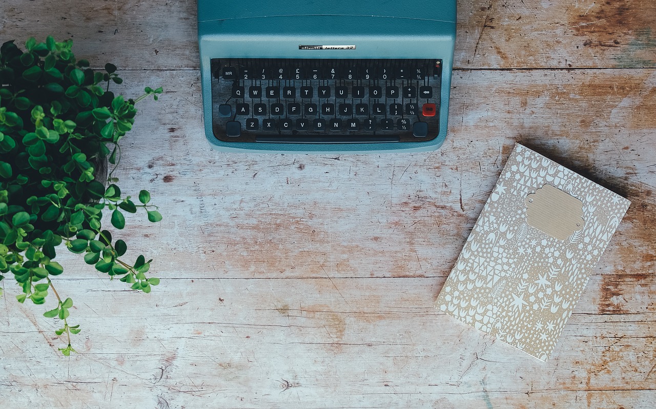 Image - vintage typewriter plant book