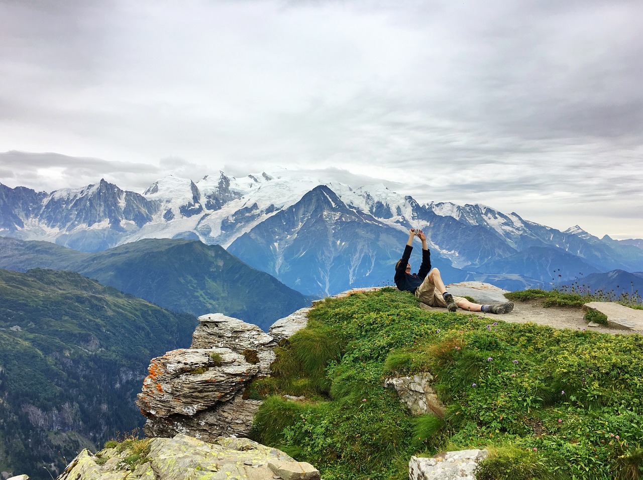 Image - man resting person cliff edge