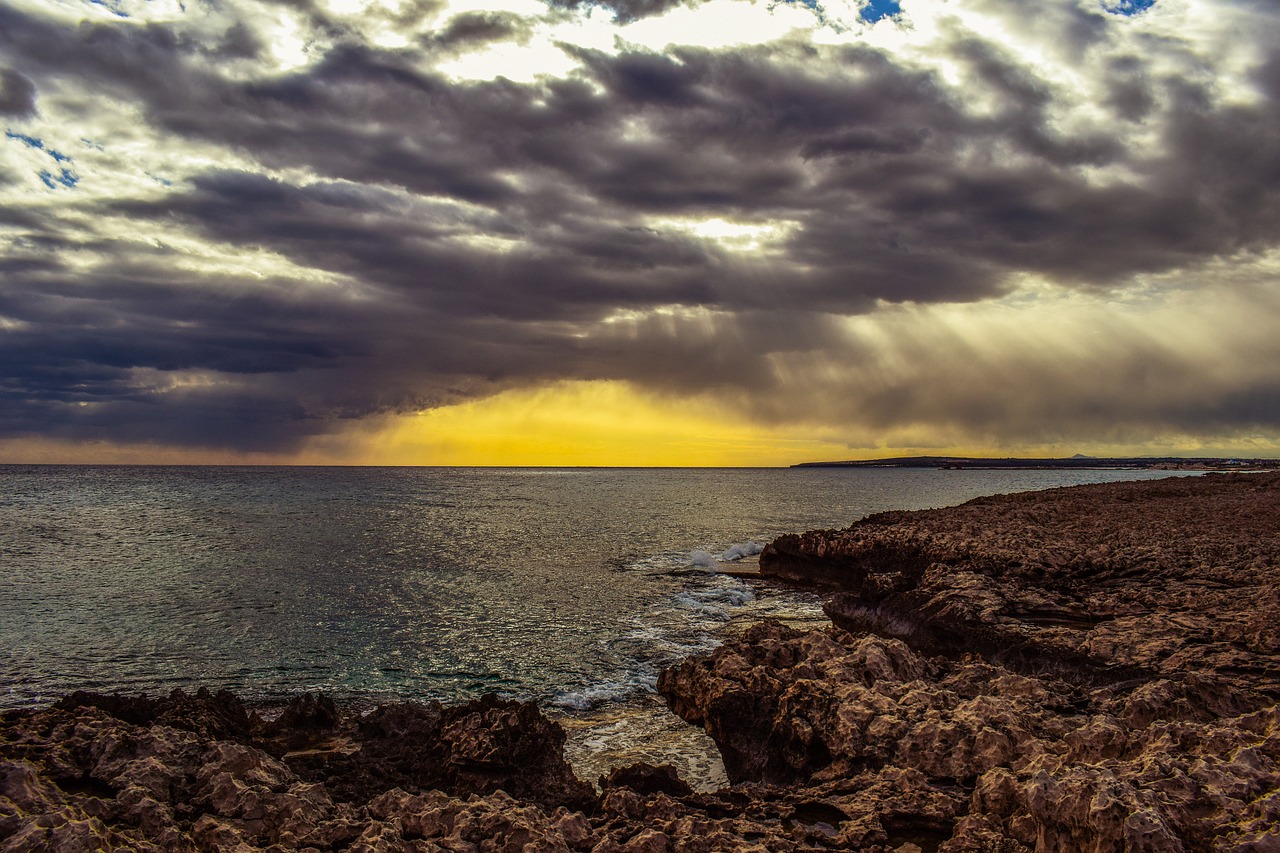 Image - rocky coast sea sky clouds stormy