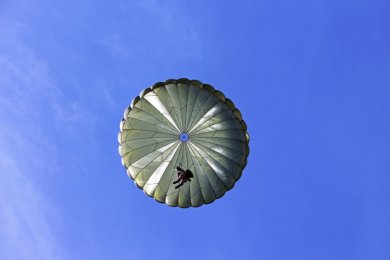 Image - parachutist jump aircraft parachute
