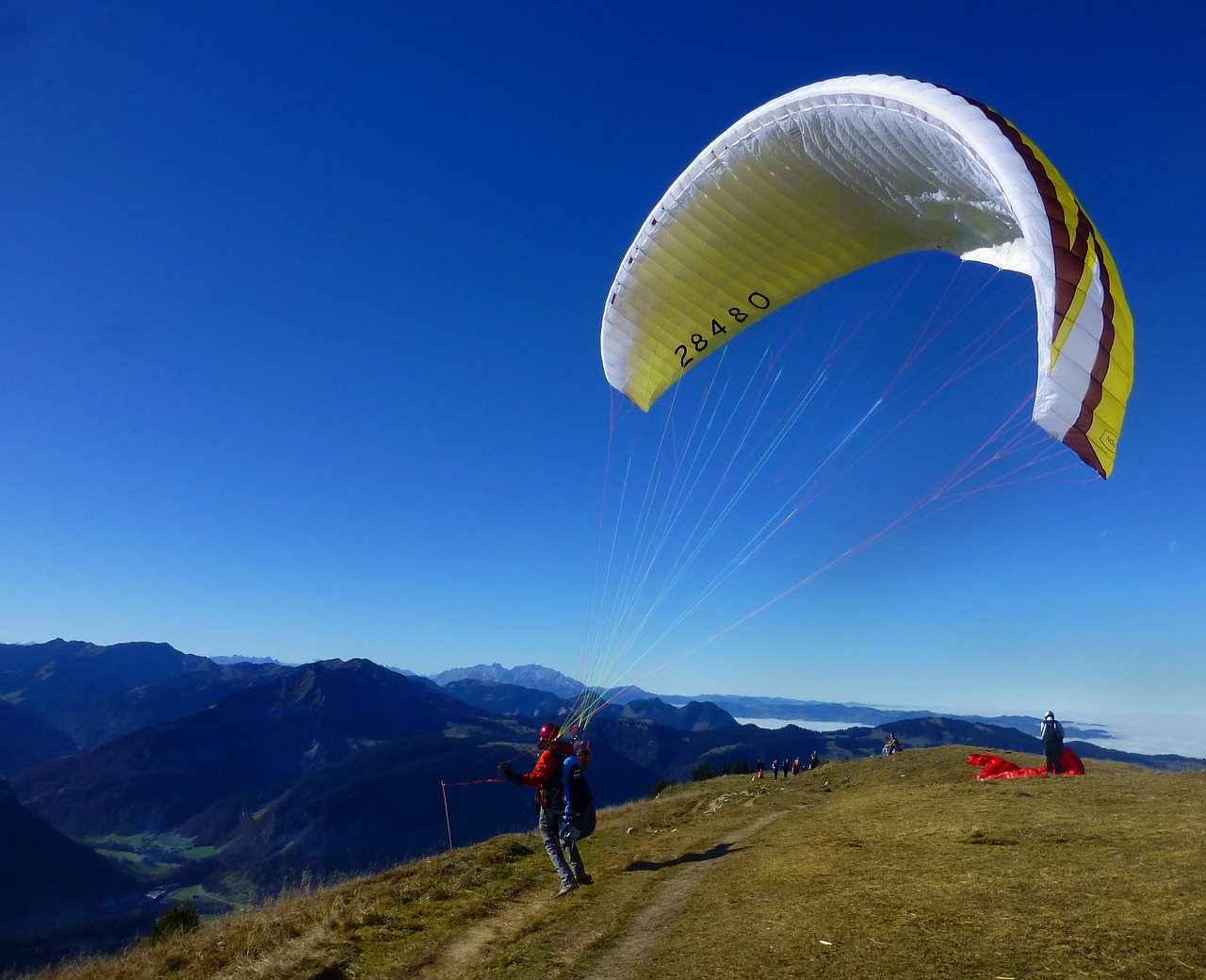 Image - paraglider wind sky mountains