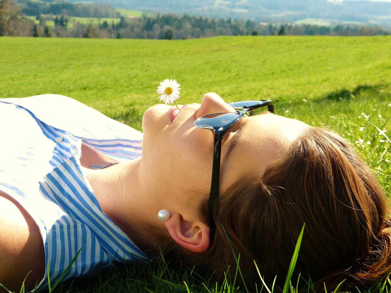 Image - young woman meadow concerns rest