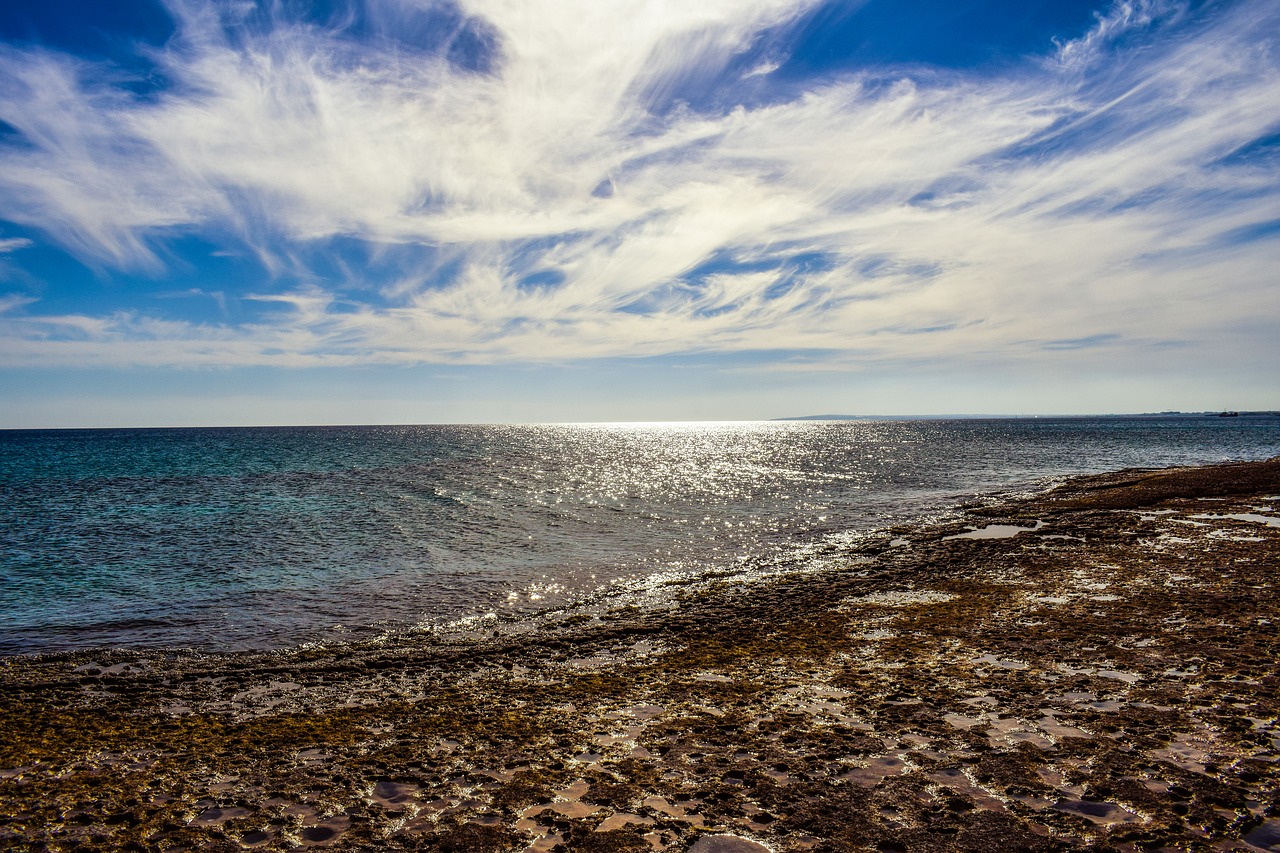 Image - sky clouds strange sea sunlight