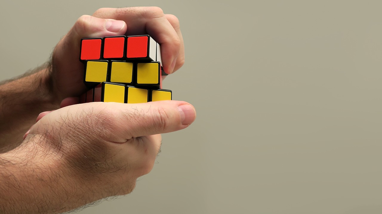 Image - hand rubik cube puzzle game