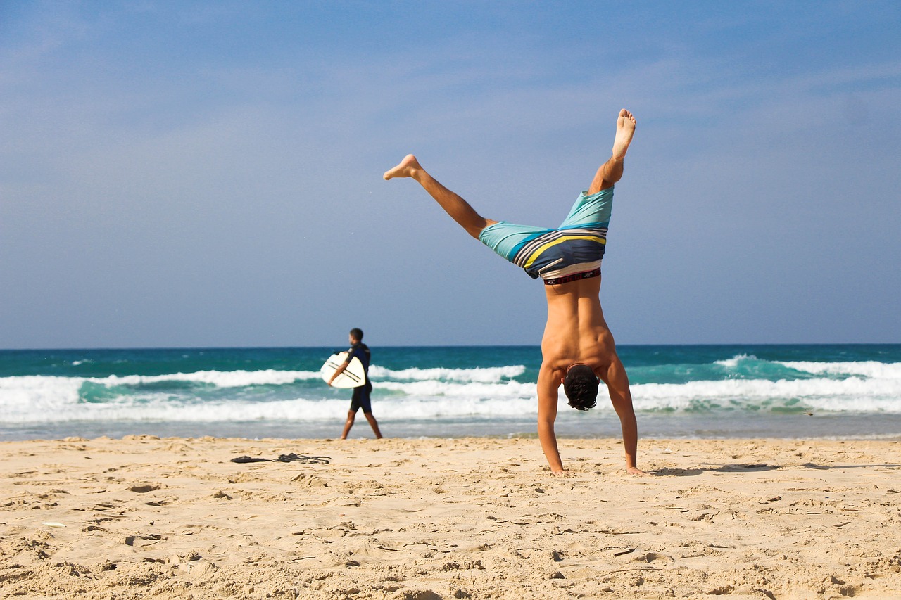 Image - handstand beach sea ocean sand