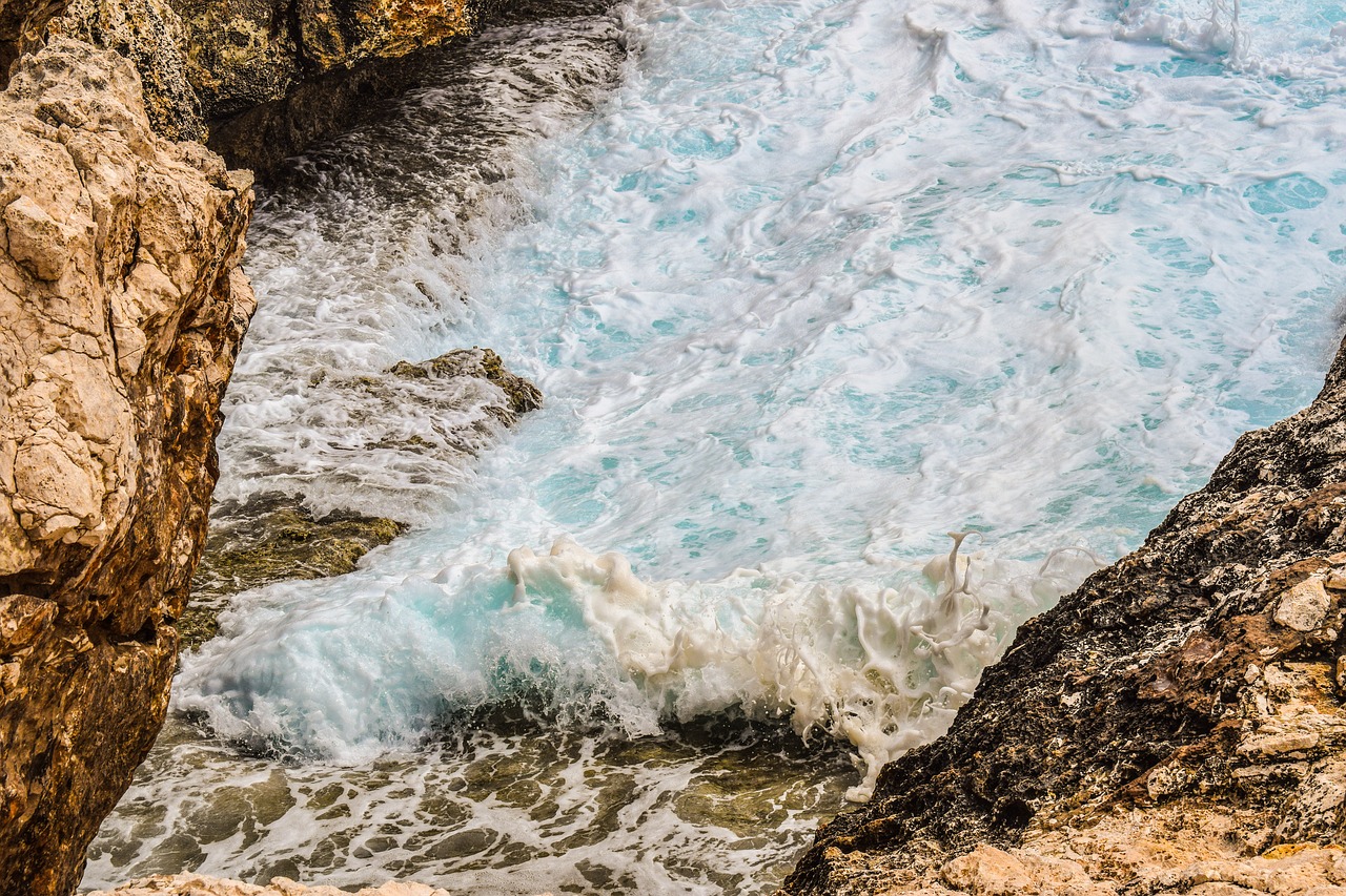 Image - wave smashing rocky coast foam