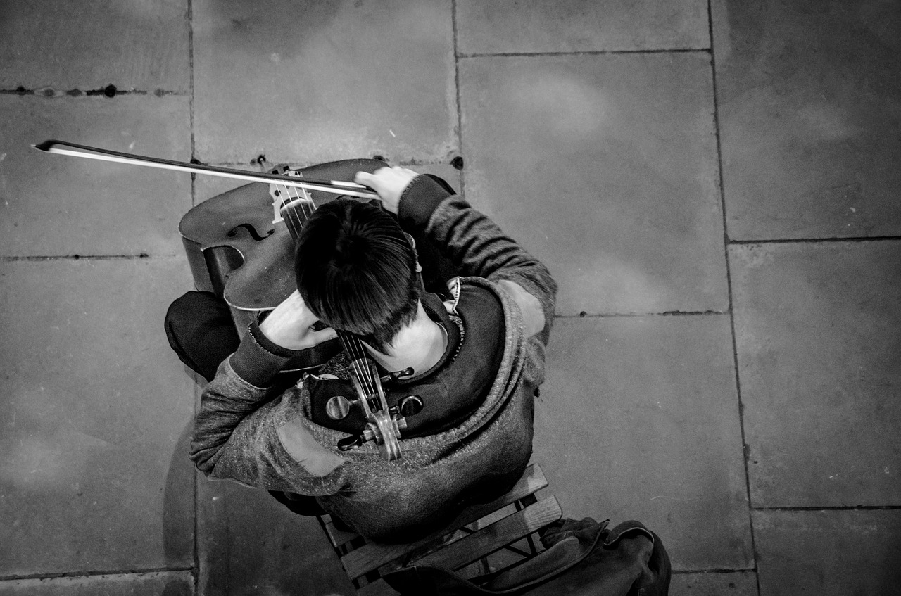 Image - cello player busker musician music