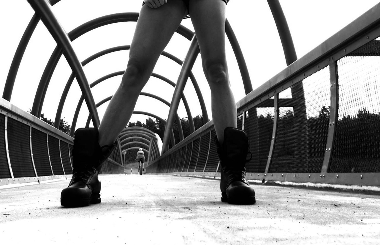 Image - cyclist bridge boots feet