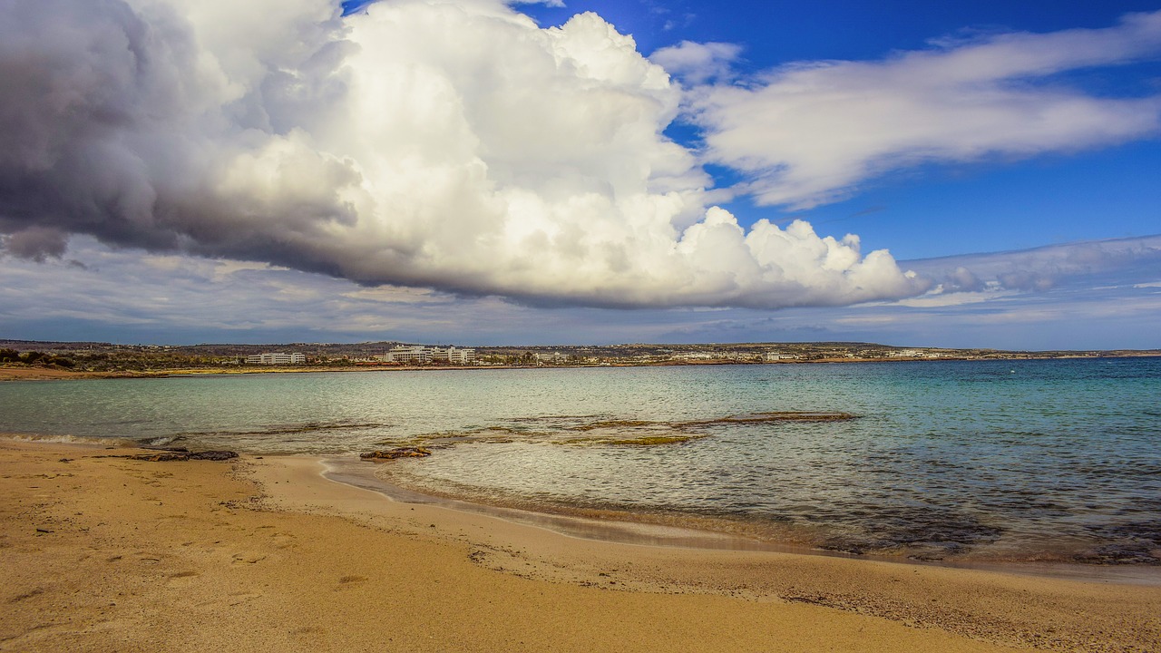 Image - beach sand sea sky clouds