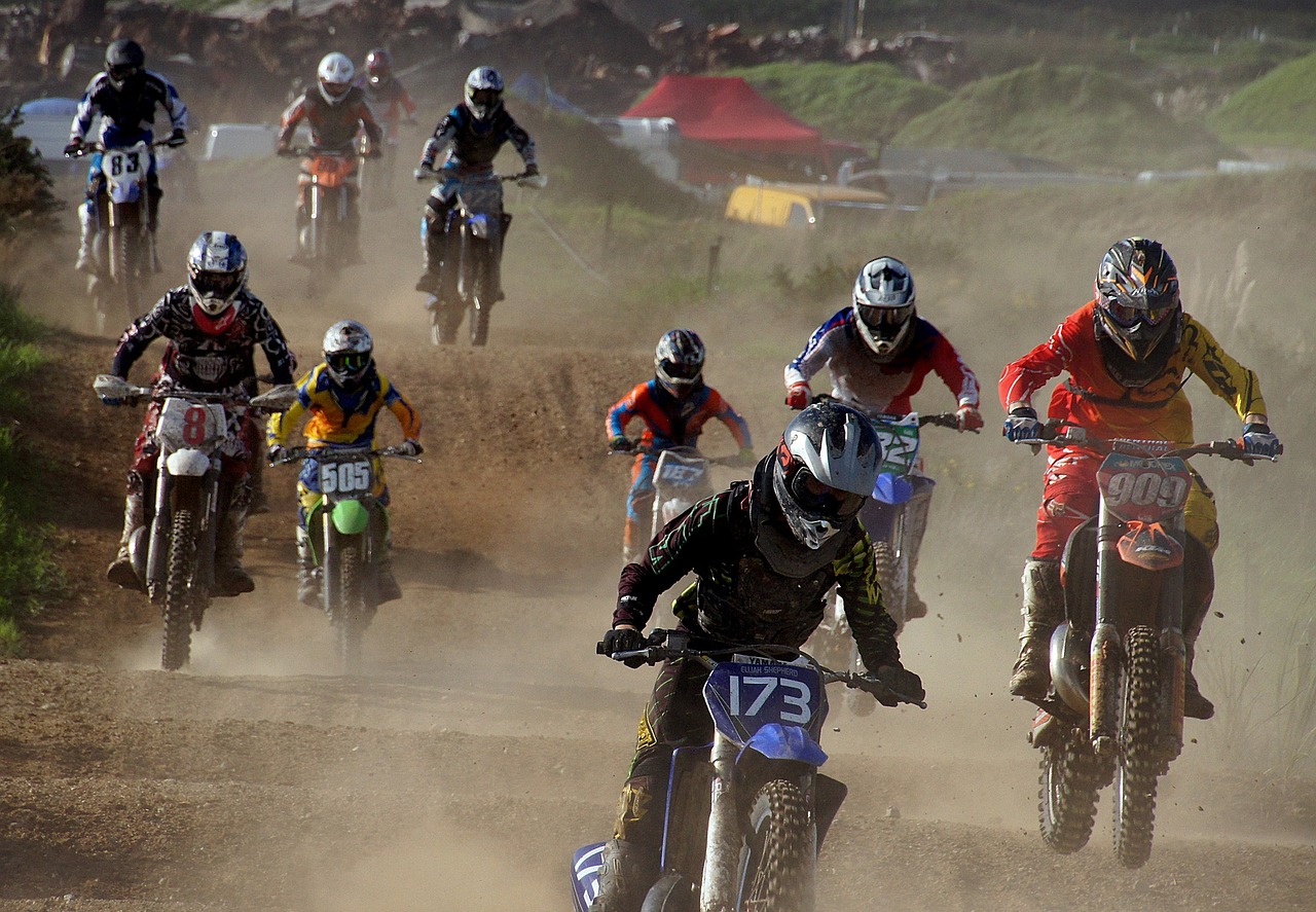 Image - motocross riders race dirt offroad