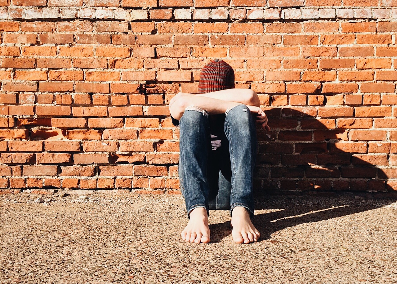 Image - person young sitting hiding alone