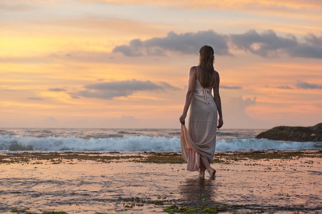 Image - sunset beach woman looking dusk