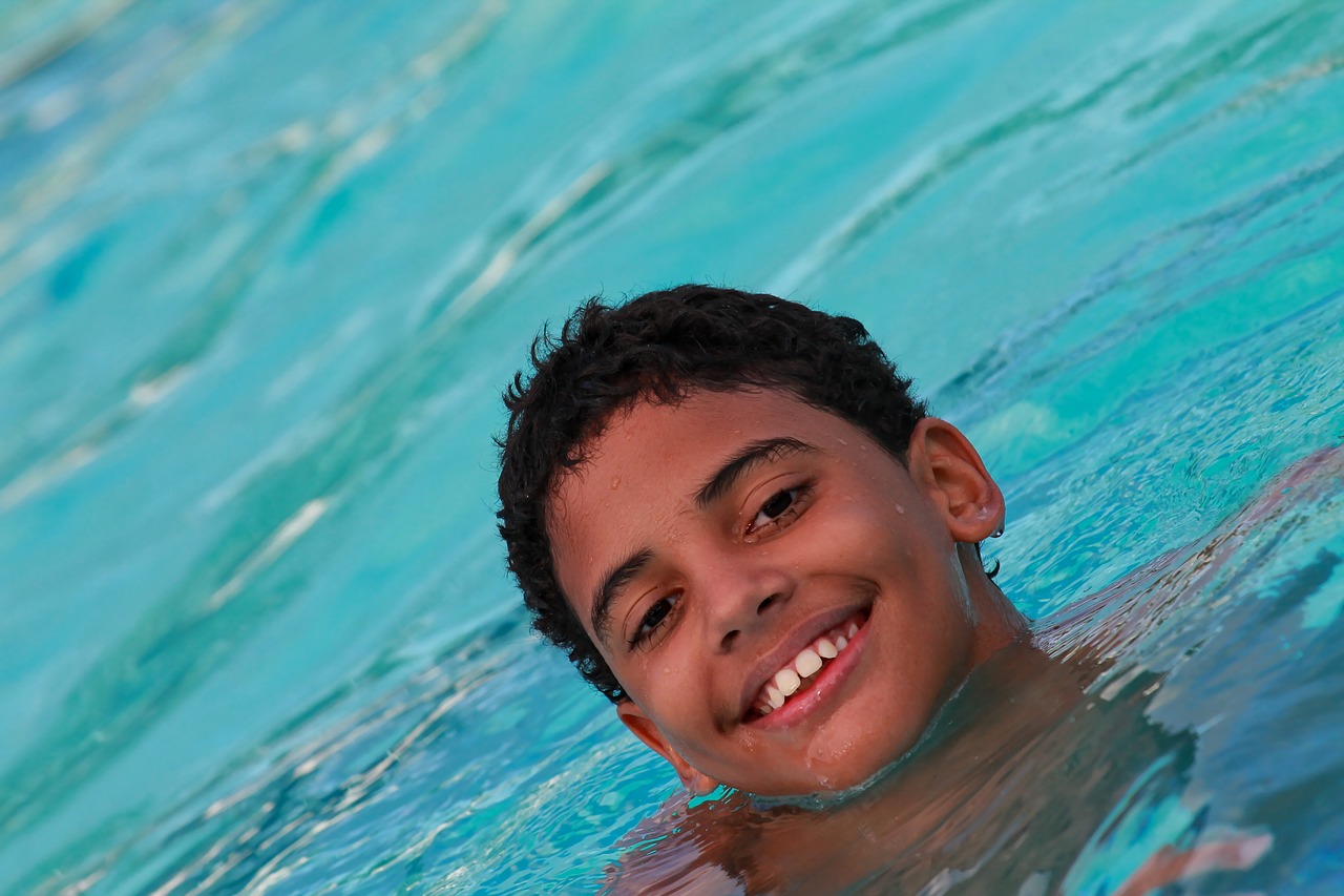 Image - swimming child pool water summer