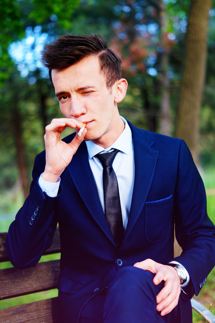 Image - man cigarette suit portrait