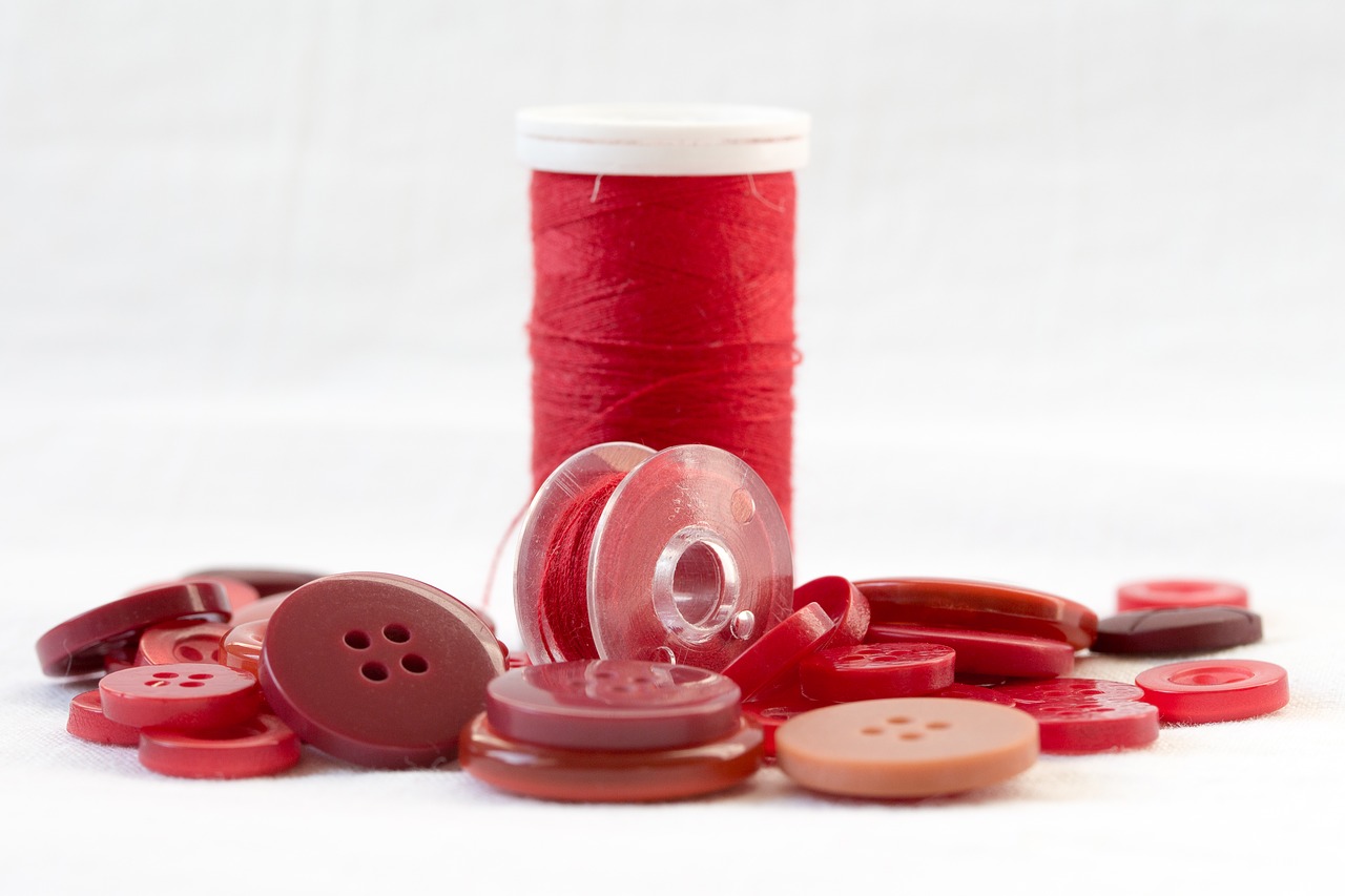 Image - thread red orb buttons sewing