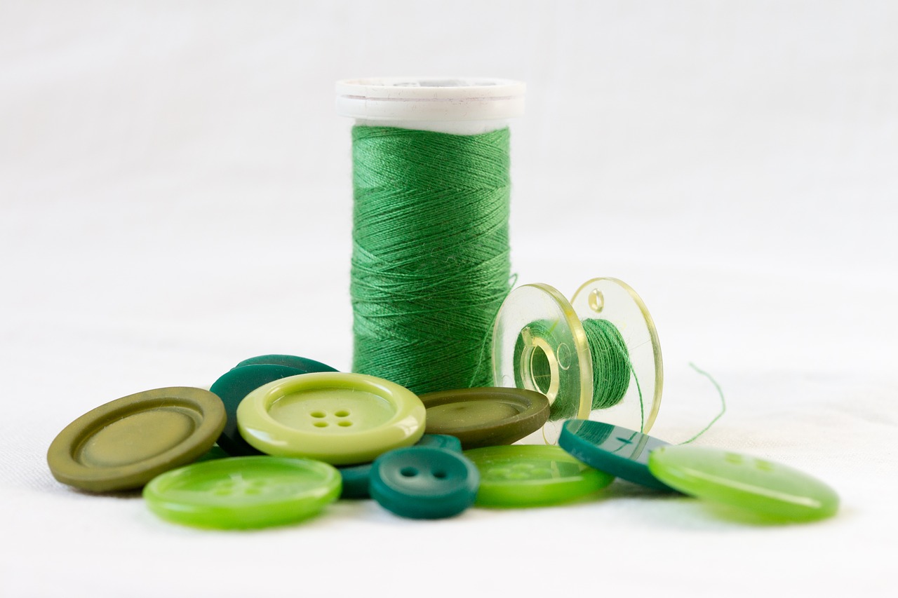 Image - thread green orb buttons sewing