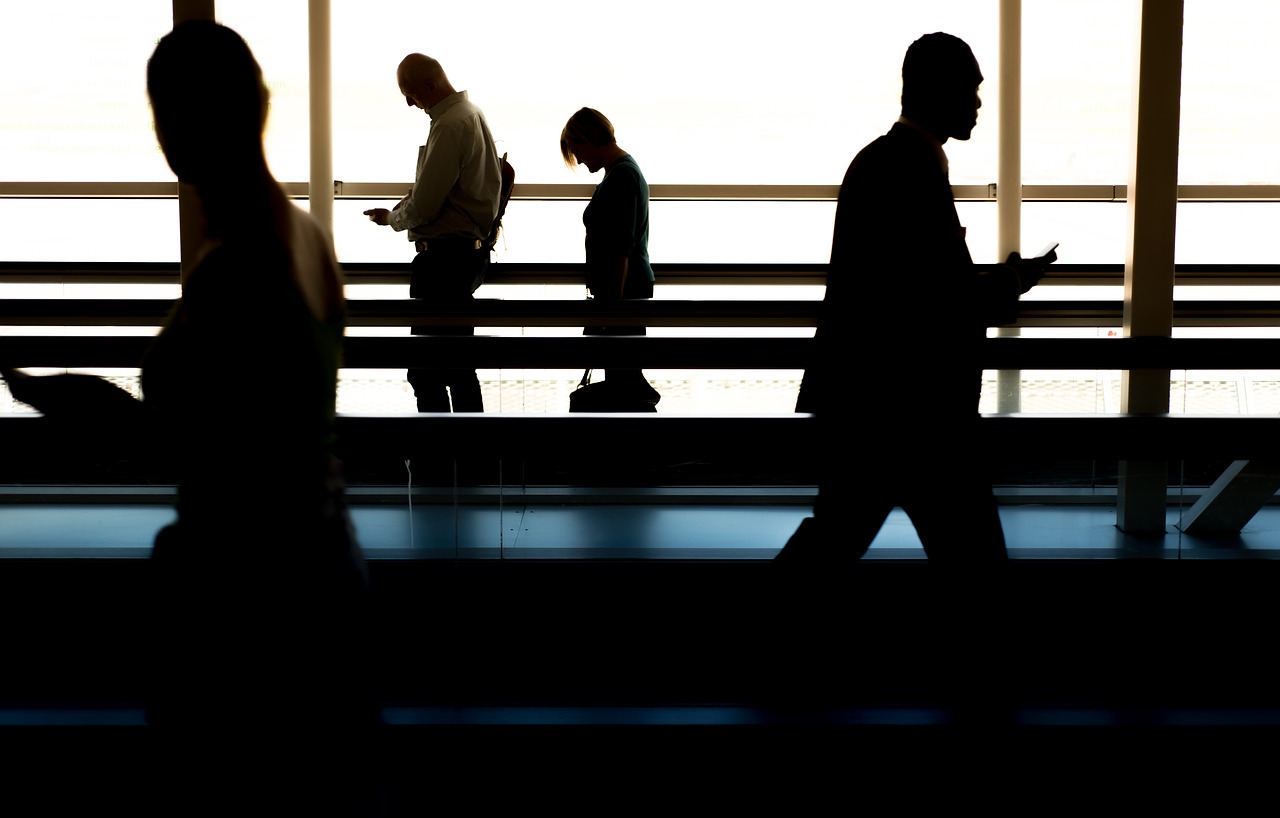 Image - people walking airport gate