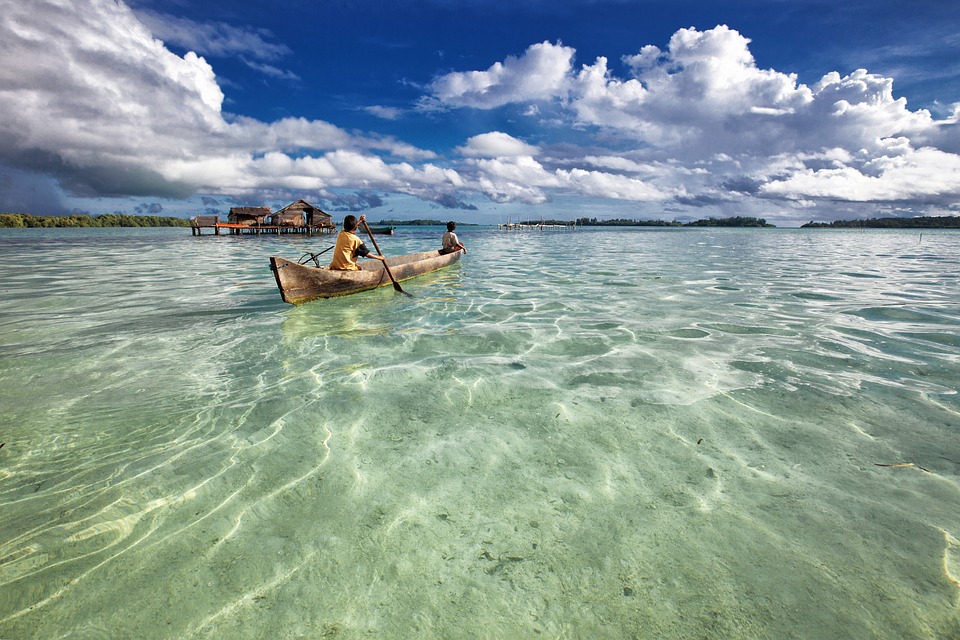 Image - lagoon dugout canoe children