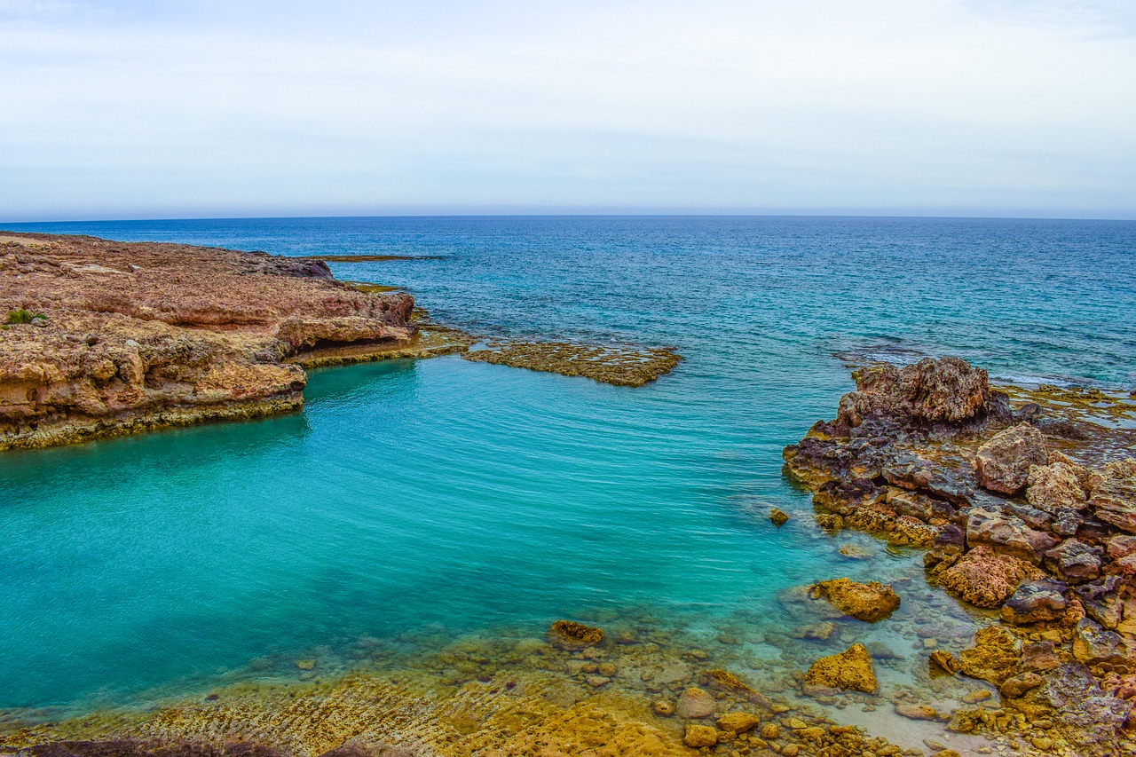 Image - rocky coast lagoon turquoise calm