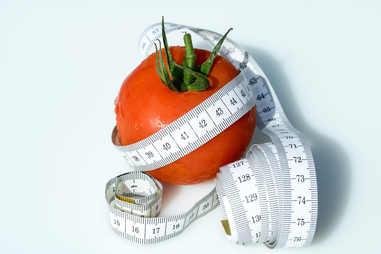 Image - tape measure tomato wrapped up