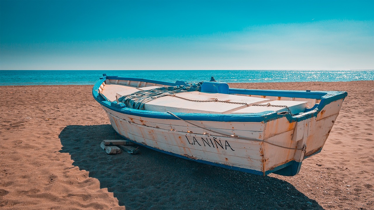 Image - andalusia boat beach sand spain
