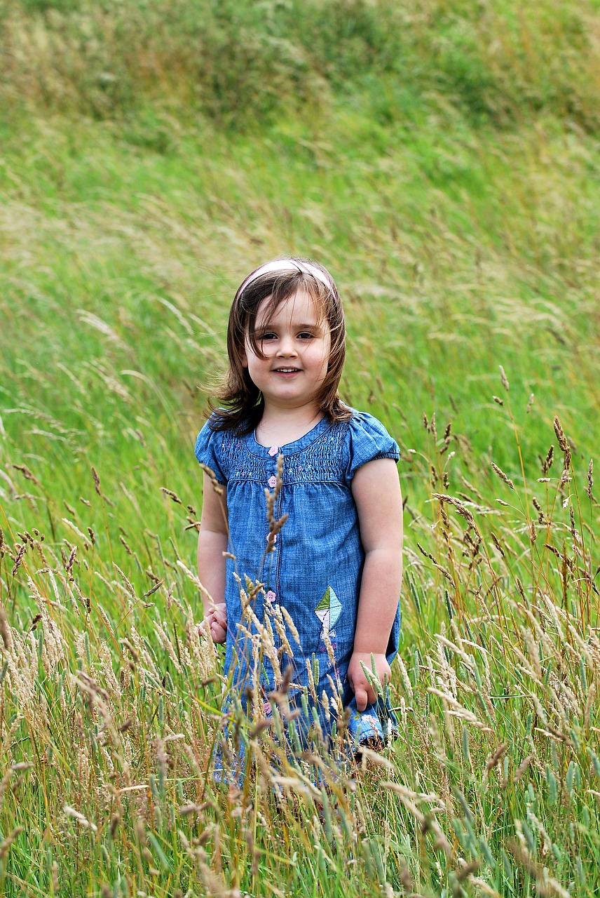 Image - child grass pose beautiful girl