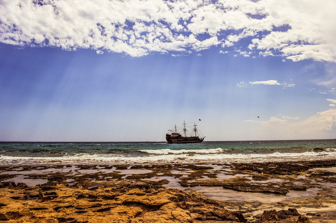 Image - beach rocky coast sea sky clouds