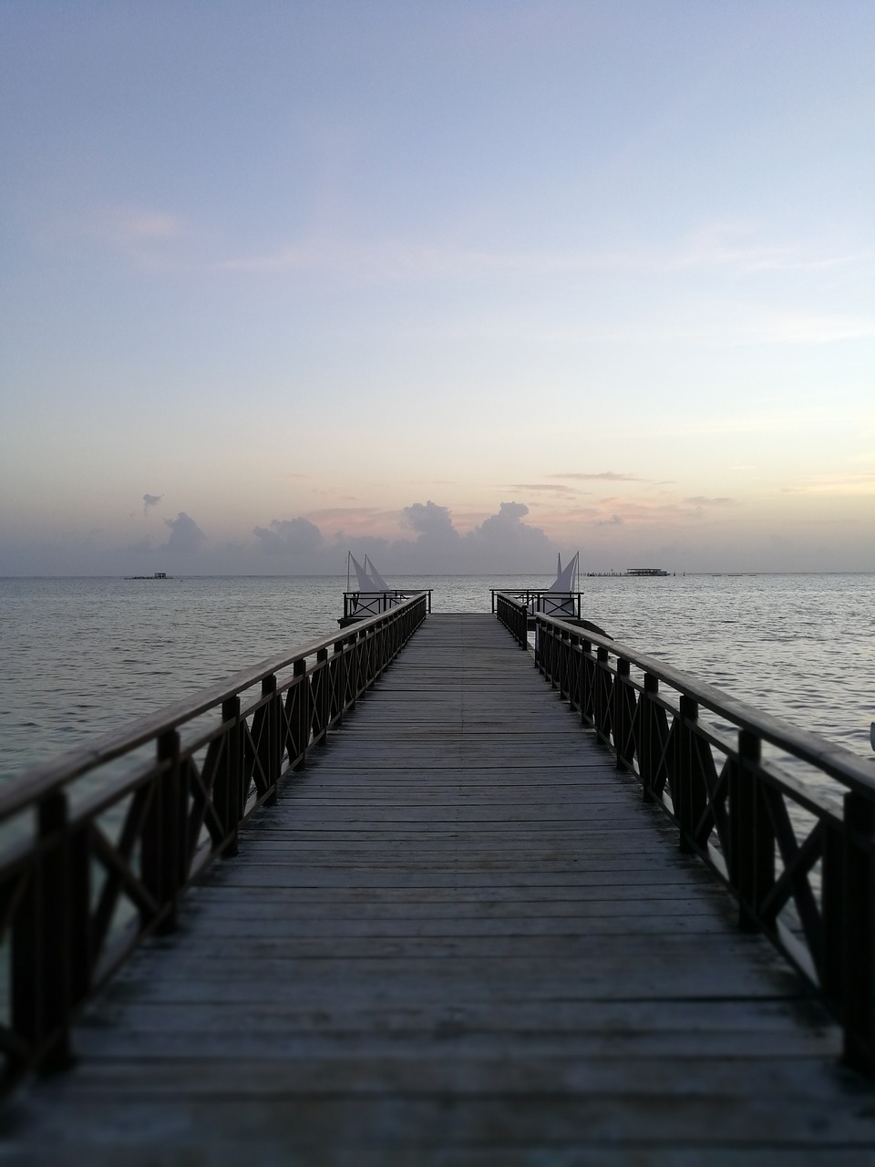 Image - pier sunset caribbean hotel