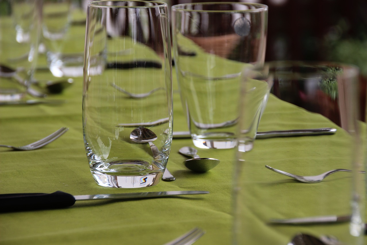 Image - glasses table covered garden party