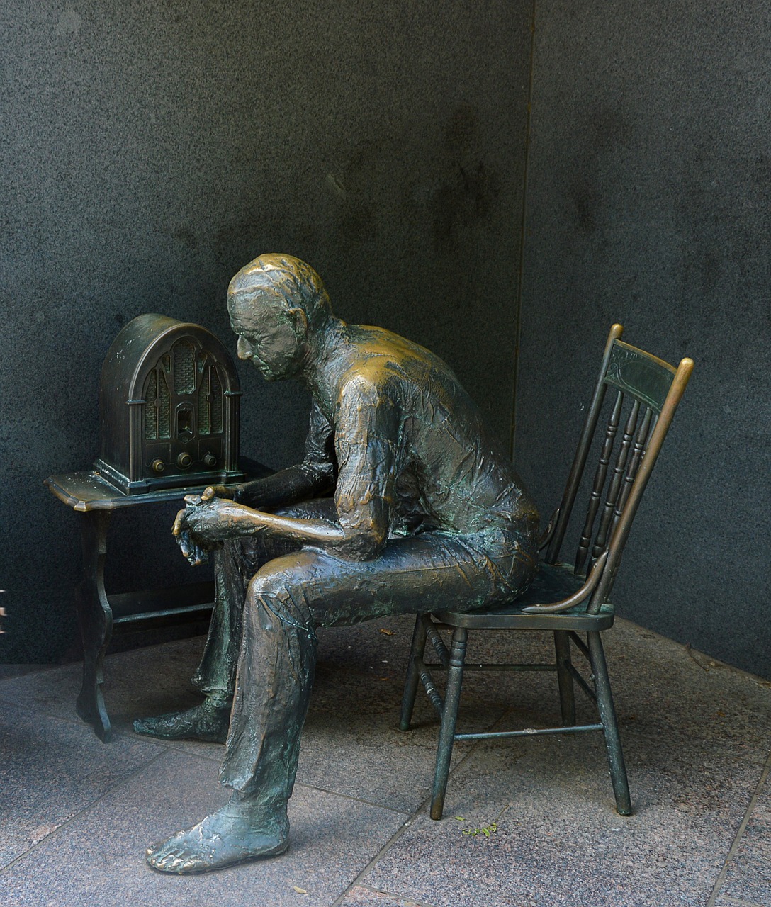 Image - statue man sitting chair